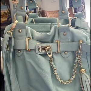 Used Mint colored Steve Madden purse